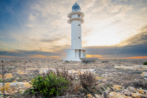 Formentera, baleares, faro Cap de Barbaria, cabo de Barbaria al atardecer  con el cielo rojo