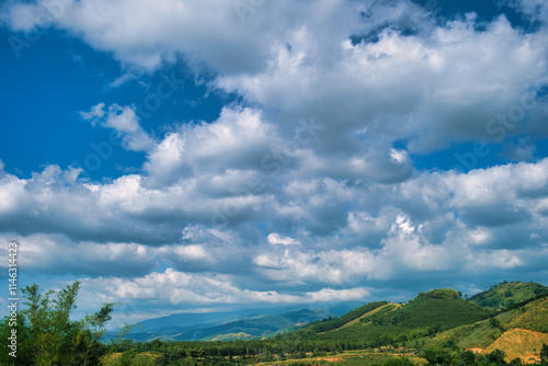 Dramatic cloudscape over the green hills of Khao Kho, province of Phetchabun, in the central north of Thailand
