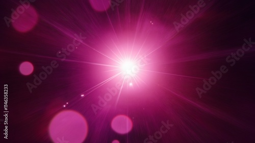 Pink lens flare effect on a dark purple background photo