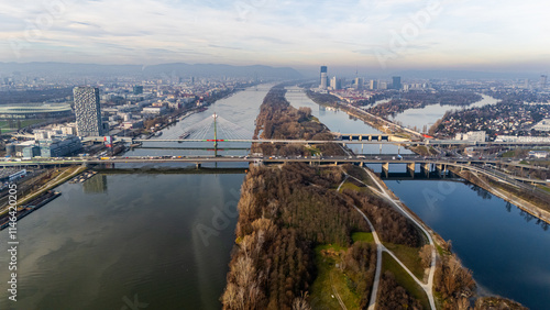 Photography Cinematic Aerial View of Vienna: Danube River, Iconic Bridges, and Cityscape
