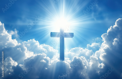 Spiritual light shines through clouds illuminating a cross in the sky above a serene landscape. Blue sky, white clouds, and rays of sunlight shining down from the above.