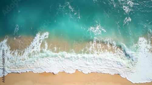 Overhead video of crashing waves on the sand, beach, Aerial view