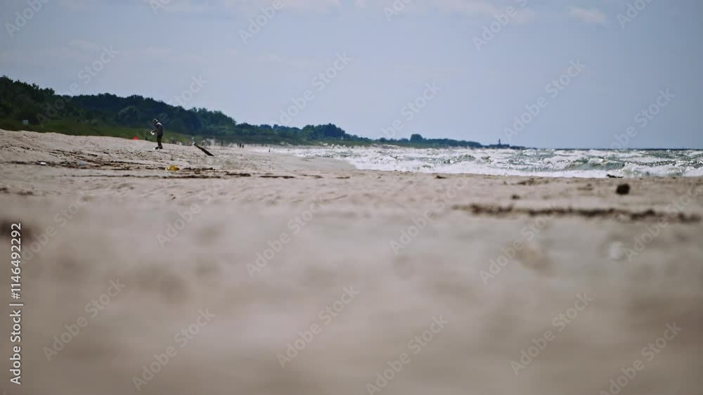 Serene coastal landscape capturing tranquil beach waves and distant shoreline