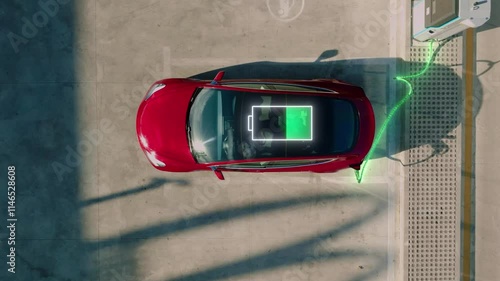 Aerial view of Charge station for electric cars. Electric car charger. Battery icon indication of charging.