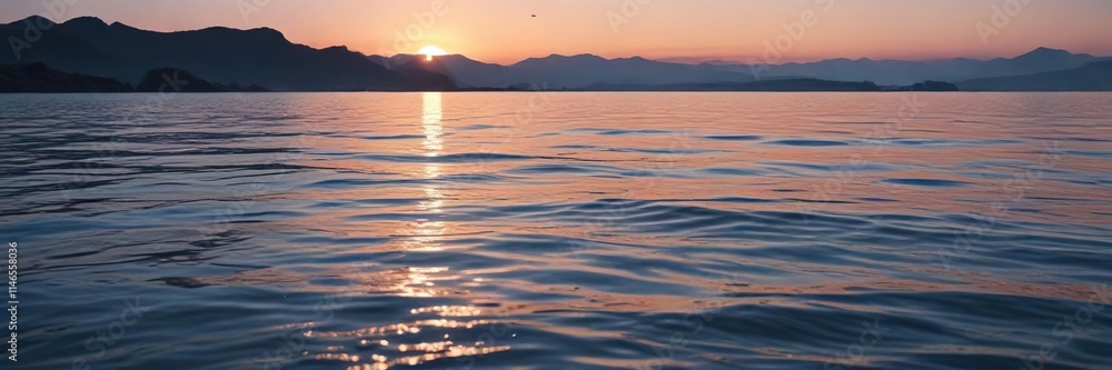 Fototapeta premium Gentle water surface with subtle ripples in a serene blue hue at dusk, blue water reflection, serene landscape
