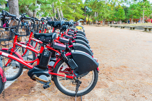 Bike Rental Station at Nara park Japan, Bicycles parked in row for rental.