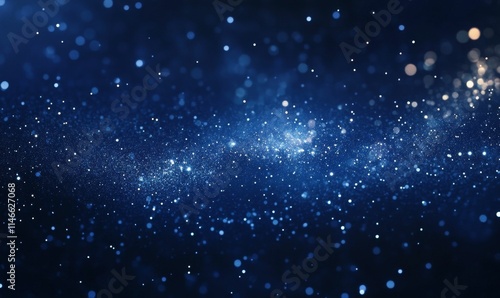 Glowing particles, dark blue background, bokeh effect.