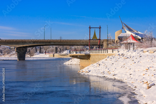 Photography A bridge over a river with a red tent on the right side