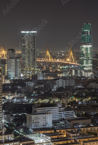 Obraz na płótnie Night view after sunset of Skyscrapers in the business district and Bhumibol Bridge. Beautiful city of Bangkok with bright glowing lights in the sundown, use it as your Wallpaper, Poster andCopy space w salonie
