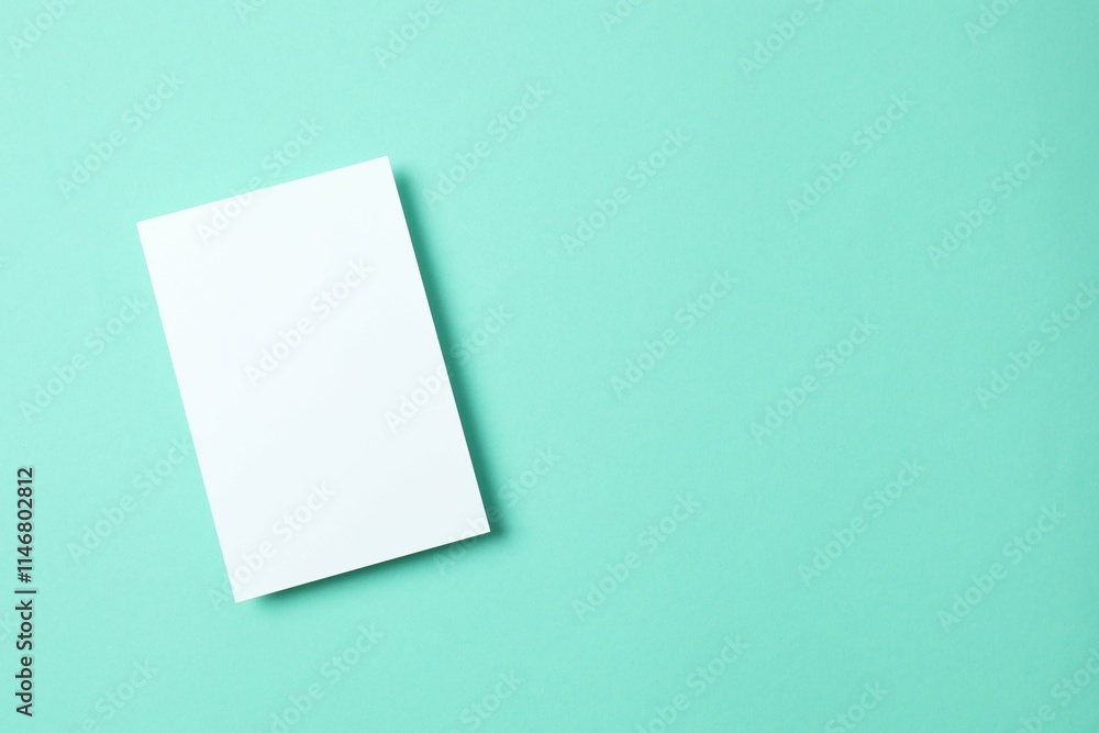 Paper card on color background. Empty greeting card for text design Paper card on color background. Empty greeting card for text design