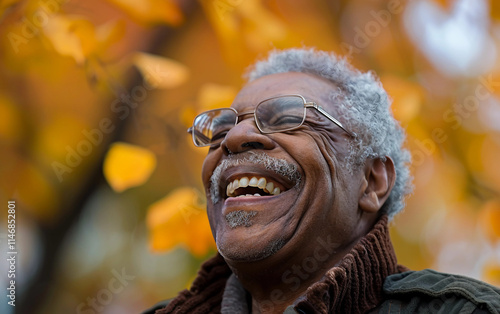 A cheerful image of a man laughing freely with authentic happiness photo