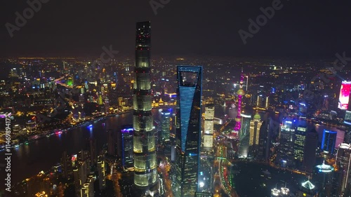 Wallpaper Mural SHANGHAI, CHINA - NOVEMBER 7, 2024: Spectacular aerial view of Shanghai skyline illuminated at night showcasing city lights and modern architecture Torontodigital.ca