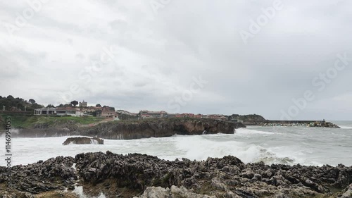 Wallpaper Mural Waves crashing against rugged cliffs in Llanes, Asturias, showcasing the wild beauty of the Cantabrian Sea and stunning coastal landscapes. Torontodigital.ca