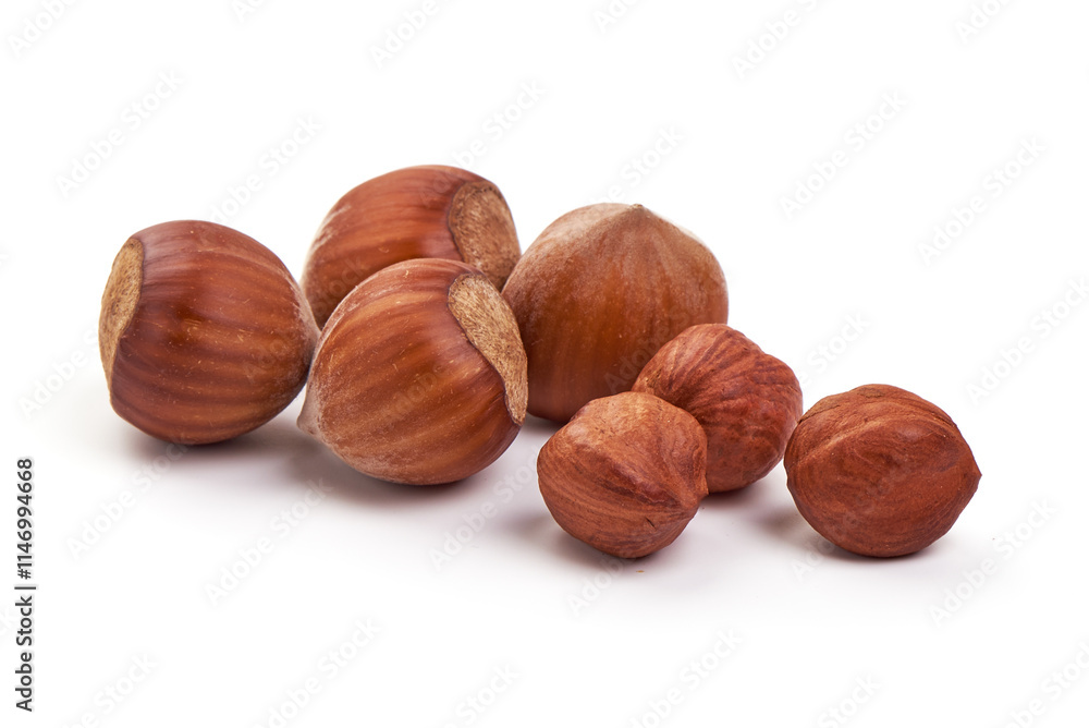 Organic Hazelnuts, isolated on white background. High resolution image. Organic Hazelnuts, isolated on white background. High resolution image.
