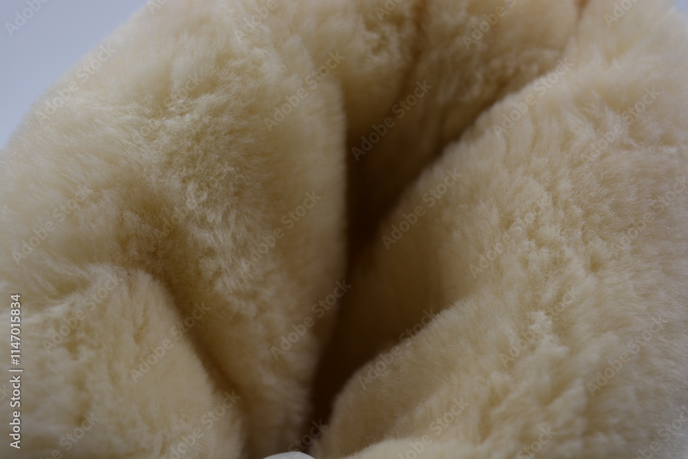 Things, material objects, fluffy fur, fur background. A warm, fluffy, brown, golden background in the form of animal skins made of synthetic materials. Things, material objects, fluffy fur, fur background. A warm, fluffy, brown, golden background in the form of animal skins made of synthetic materials.
