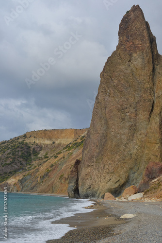 Cape Fiolent Crimea Picturesque seascape Fantastic view Beautiful clouds blue sea Rocks in the water Travel Holidays by the sea Tourism