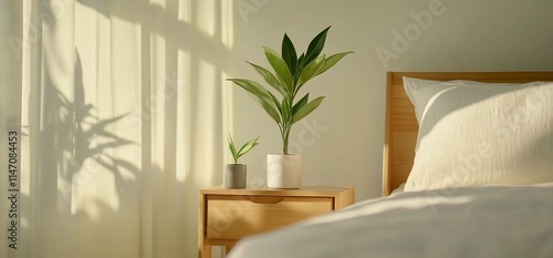 A serene bedroom scene featuring plants on a nightstand.