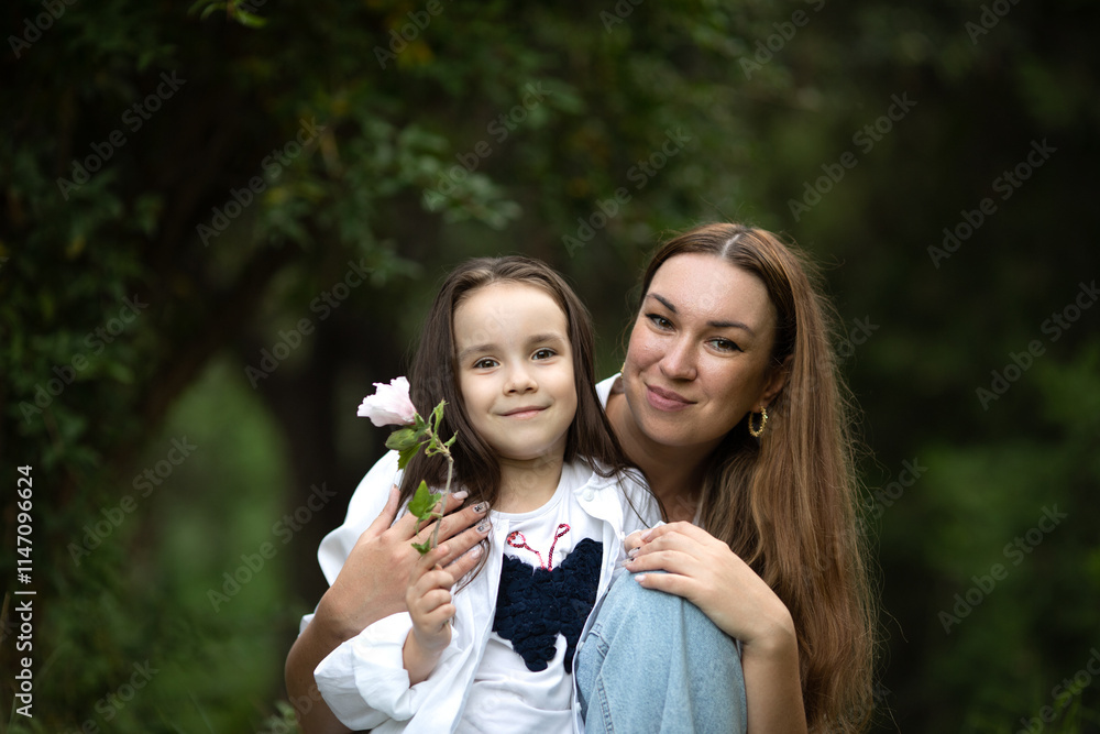 couple in the park, mom and daughter, closeup portrait couple in the park, mom and daughter, closeup portrait