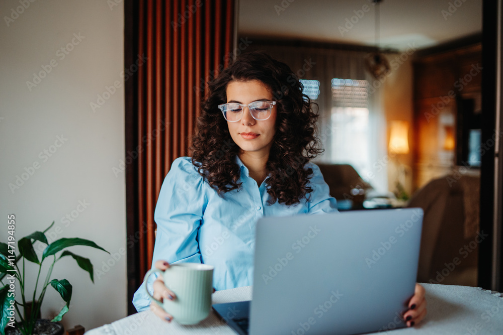 Young caucasian woman working on laptop from home Young caucasian woman working on laptop from home