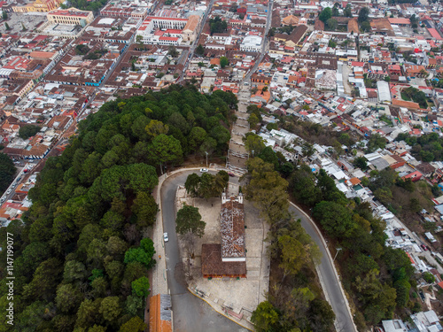 Obraz na płótnie Aerial Drone shot of Church Iglesia de San Cristobalito on the mountain in San Cristobal de Las Casas, Chiapas, Mexico w salonie