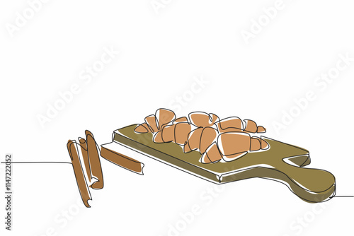 Continuous one line drawing cinnamon crescents on cutting board and few cinnamon sticks. Get ready to serve a healthy snack. National Cinnamon Crescent Day. Single line draw design vector illustration