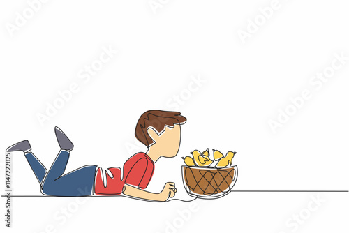 Continuous one line drawing the little boy prone giving kisses to the chicks in the basket. The first chicken farming experiment. National Farm Animals Day. Single line draw design vector illustration