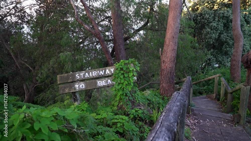 Wooden Beach sign, Stairway to Beach next to steps