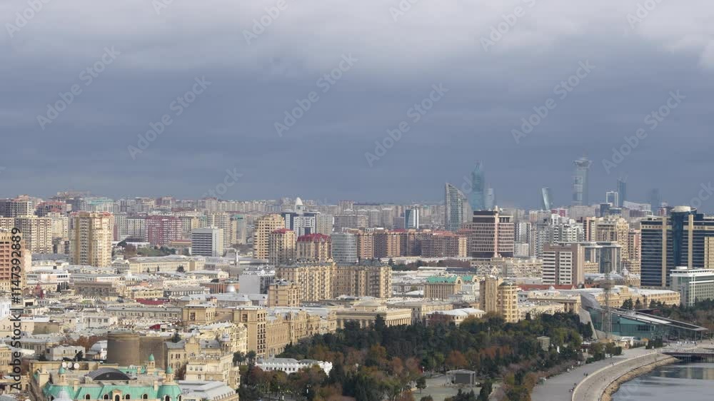 Panoramic view of Baku city with a blend of historic structures, modern skyscrapers, and the Caspian Sea skyline. Baku, Azerbaijan Panoramic view of Baku city with a blend of historic structures, modern skyscrapers, and the Caspian Sea skyline. Baku, Azerbaijan