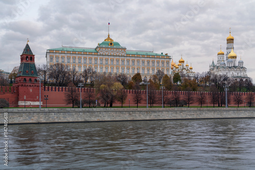 View of the building of the Grand Kremlin Palace, the Annunciation Tower and the ensemble of the Kremlin Cathedral Square from the embankment of the Moskva River, Moscow, Russia