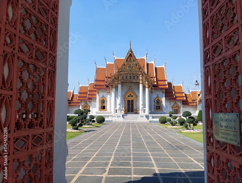 Wat Benchamabophit Dusit Wanaram Ratchaworawihan Temple-Bangkok Thailand- April 15: An unidentified tourist at Wat Benchamabophit on April 15  2018, in Bangkok Thailand. photo