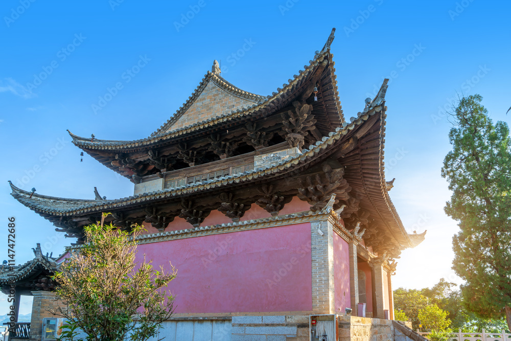 Ancient buildings on the shore of Yilóng Lake in Shiping County, Yunnan, China. Ancient buildings on the shore of Yilóng Lake in Shiping County, Yunnan, China.