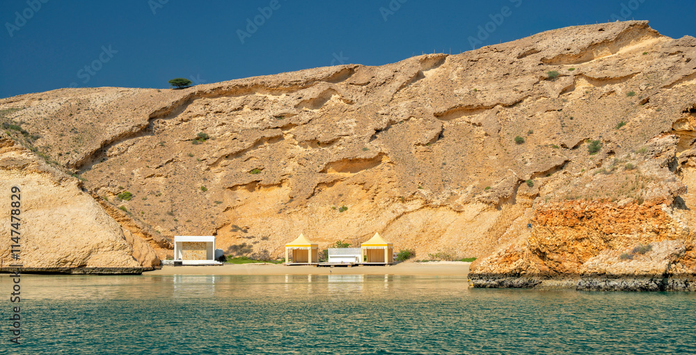 Naklejka premium Beach and bay Gulf of Oman. Summer holidays and tourism in the Beautiful Arab country. Muscat, Oman