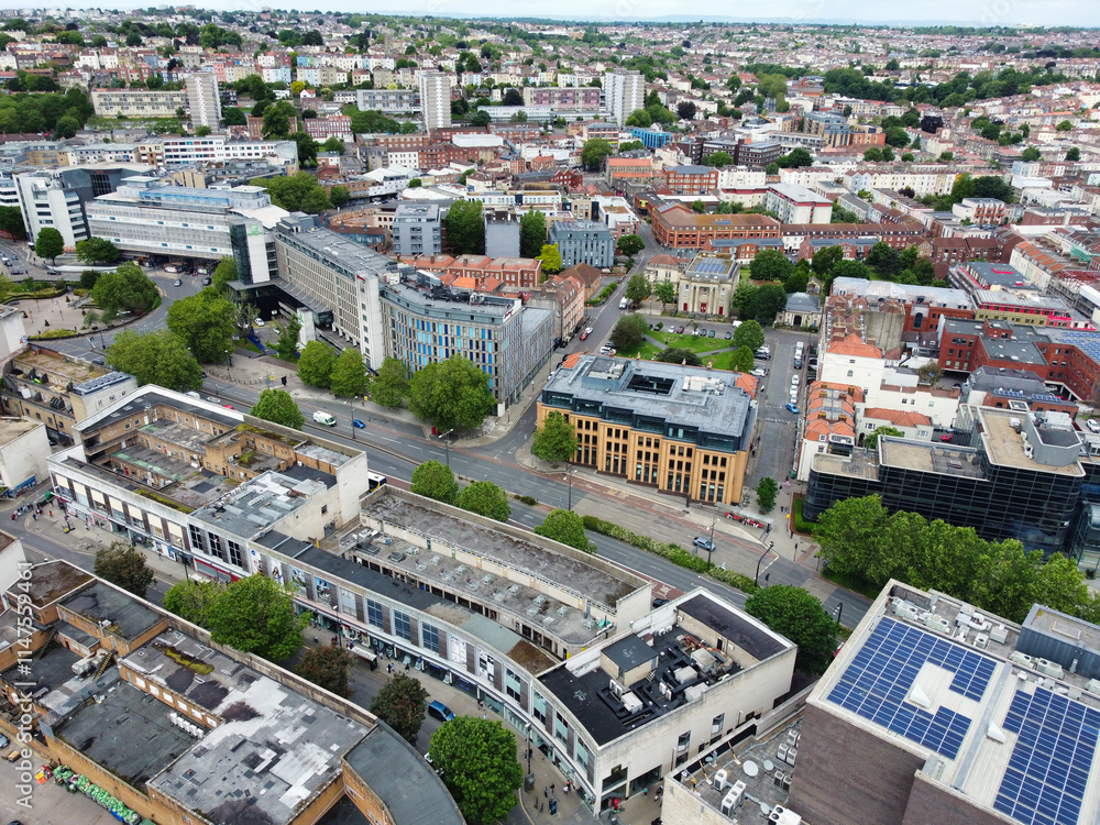 Fototapeta premium An Aerial View of Buildings at Central Bristol City of Southwest of England, United Kingdom. May 26th, 2024. The High Angle Footage Was Captured with Drone's Camera from Medium High Altitude.
