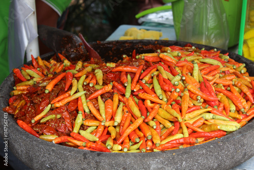 Pile of chili or peppers to make sambal, traditional sauce from Indonesia photo