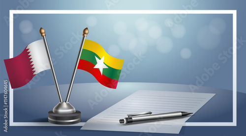 Qatar and Myanmar National flags on small table with bokeh background, cooperative relationship