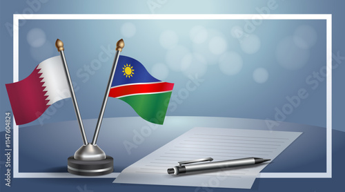 Qatar and Namibia National flags on small table with bokeh background, cooperative relationship