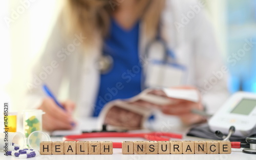 A healthcare professional thoroughly discussing various health insurance options with patients to provide clarity photo