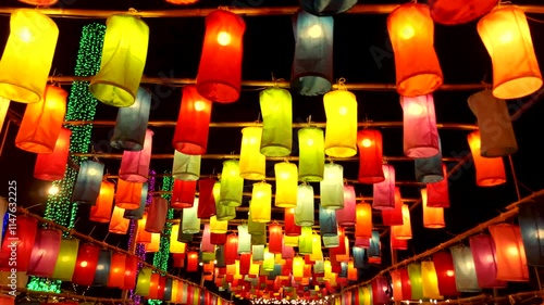 UMulti-colored lantern arches hang as decorations during the New Year festival in rural Thailand.ntitled Project