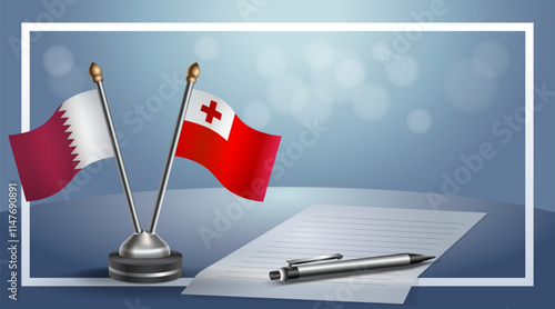 Qatar and Tonga National flags on small table with bokeh background, cooperative relationship