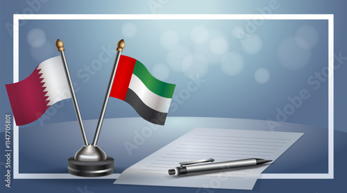 Qatar and United Arab Emirates National flags on small table with bokeh background, cooperative relationship