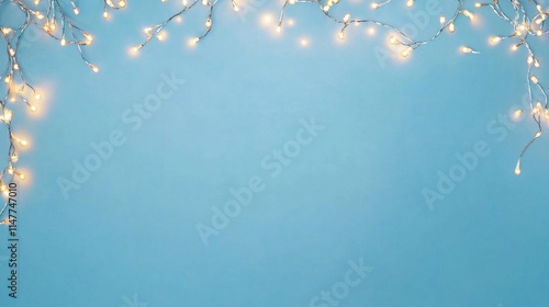 Holiday banner with glowing christmas lights in vibrant colors on a festive blue background

