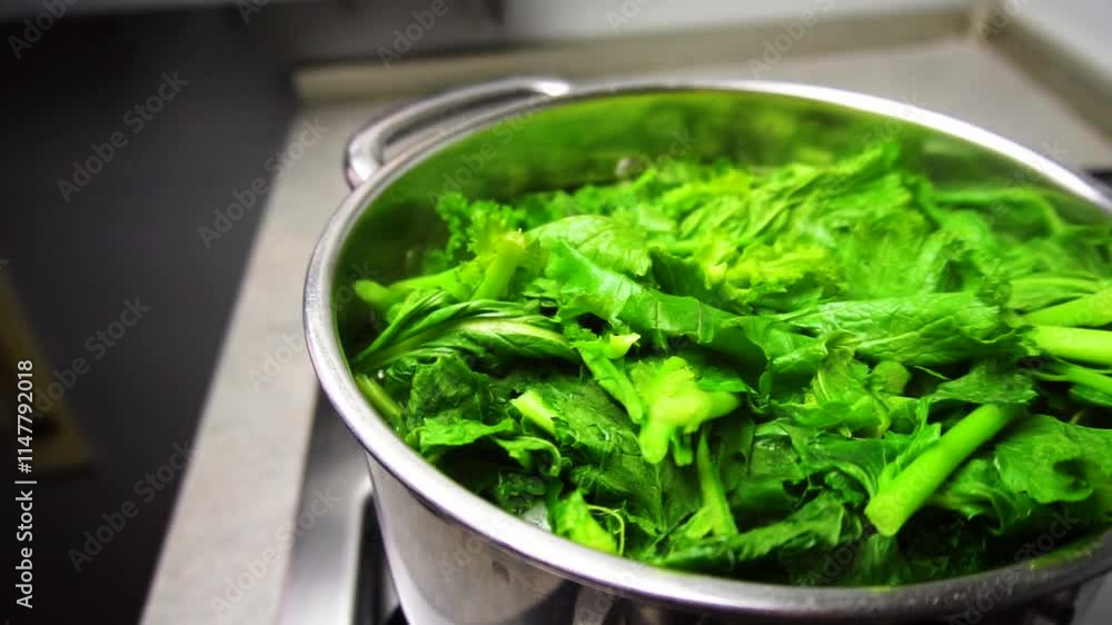Boiling turnip greens with the intent of cooking them for the apulian dish Boiling turnip greens with the intent of cooking them for the apulian dish