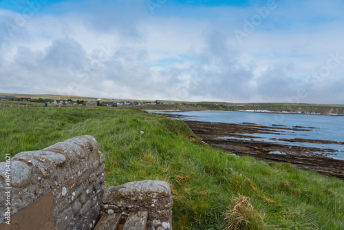 Scenic coastal view along Victoria Walk in Thurso, Scotland photo