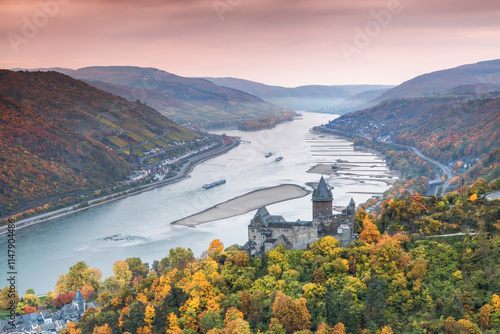 Burg Stahleck castle and river Rhine in autumn at sunrise, Rhineland-Palatinate, Germany photo