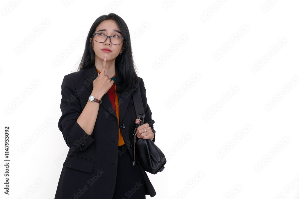 Asian businesswoman standing alone with calm facial expression Asian businesswoman standing alone with calm facial expression