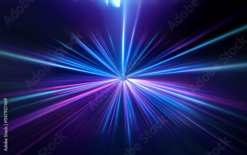 A burst of blue and purple light streaks across a dark background, radiating outward from a central point. photo