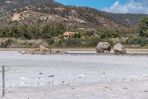 The dry pond behind the beach of Su Giudeu, Sardinia, Italy photo