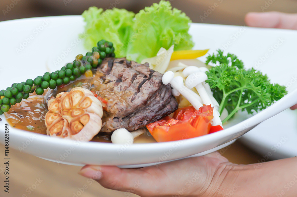 beef steak in gravy sauce or barbecued beef or grilled beef and vegetable beef steak in gravy sauce or barbecued beef or grilled beef and vegetable