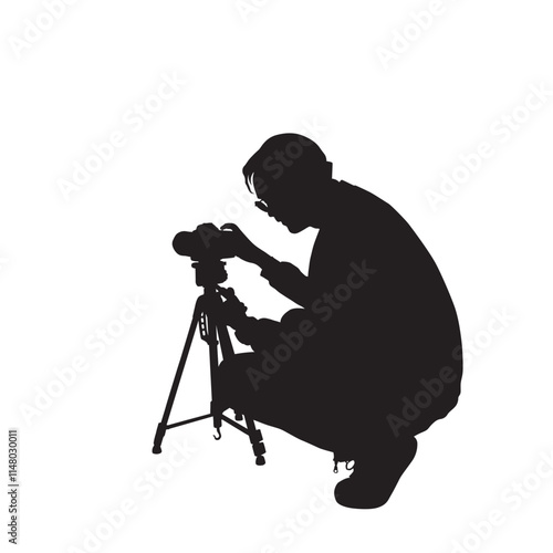 Outdoor Photography Silhouette squatting down preparing to take a picture with his tripod Camera Equipment