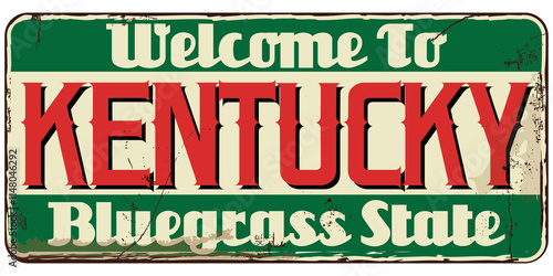 Welcome to Kentucky message on rusty banner